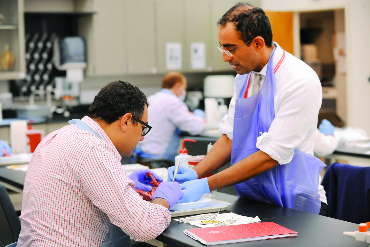 Dr Hatem Algraffee demonstrates how to perform a dental procedure at a practical workshop event at Weill Cornell Medicine-Qatar.