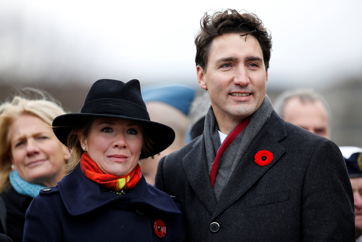 Canada's Prime Minister Justin Trudeau and his wife Sophie Gregoire Trudeau take part in Remembrance Day ceremonies at the National War Memorial in Ottawa, Ontario, Canada, November 11, 2016. REUTERS/Chris Wattie