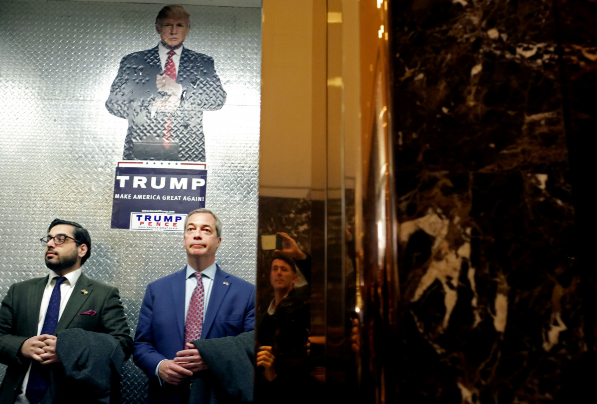 Nigel Farage (C), leader of the UK Independence Party, arrives to Trump Tower on November 12, 2016 in New York City.  (Yana Paskova/Getty Images/AFP) 