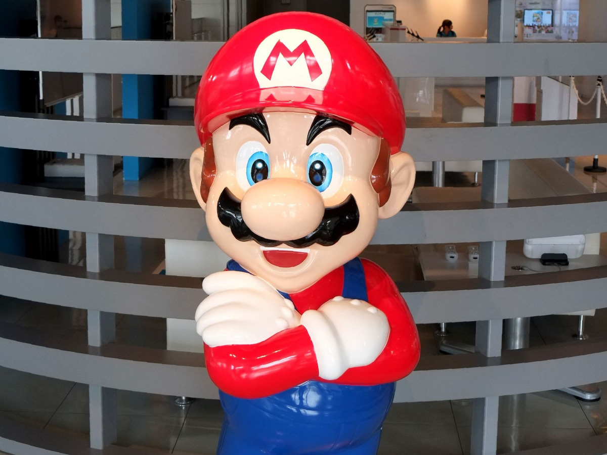 (FILES) A file picture taken on September 8, 2016 shows the logo of Japanese gaming giant Nintendo and its game character Super Mario being displayed at a showroom in Tokyo.  AFP / KAZUHIRO NOGI