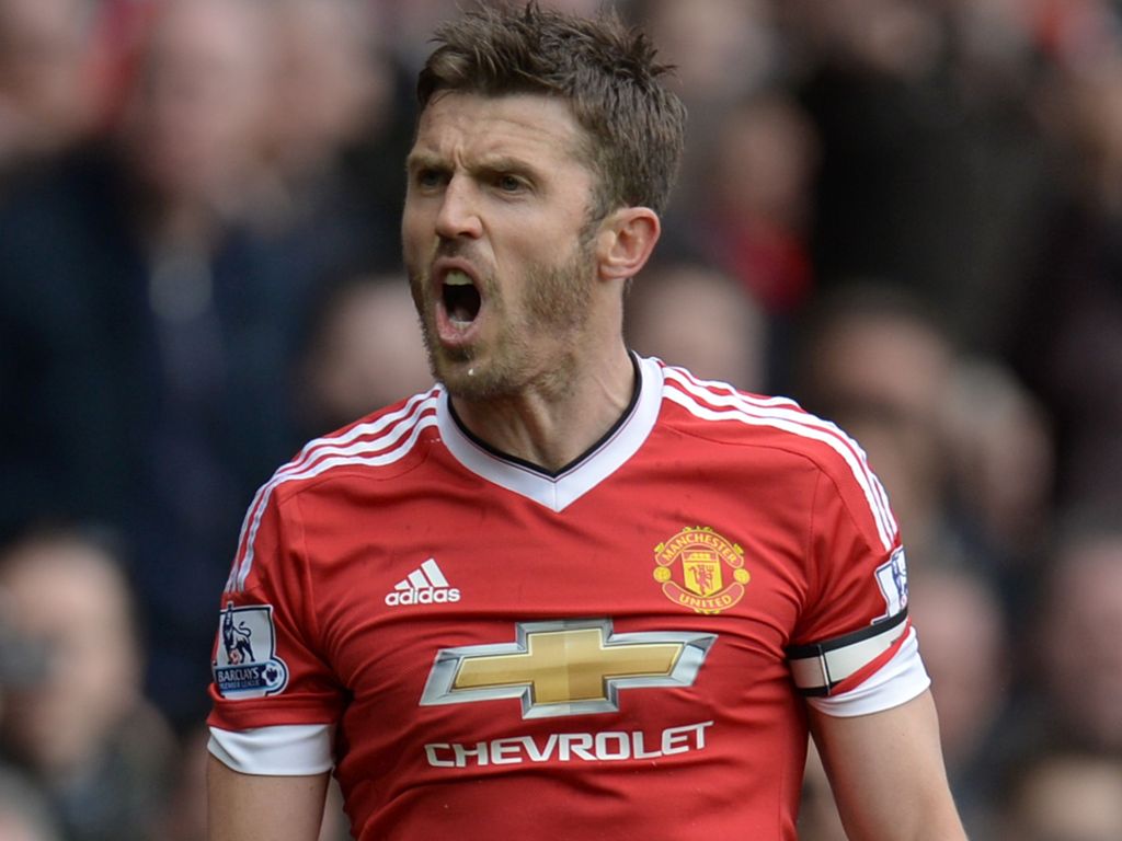 (FILES) This file photo taken on April 03, 2016 shows Manchester United's English midfielder Michael Carrick reacting during the English Premier League football match between Manchester United and Everton at Old Trafford in Manchester, north west England,