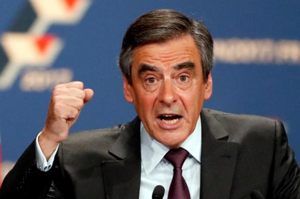 French politician Francois Fillon, member of the conservative Les Republicains political party, attends a final rally ahead of Sunday's first round of vote to choose the conservative candidate for France's presidential election in Paris, France, November 