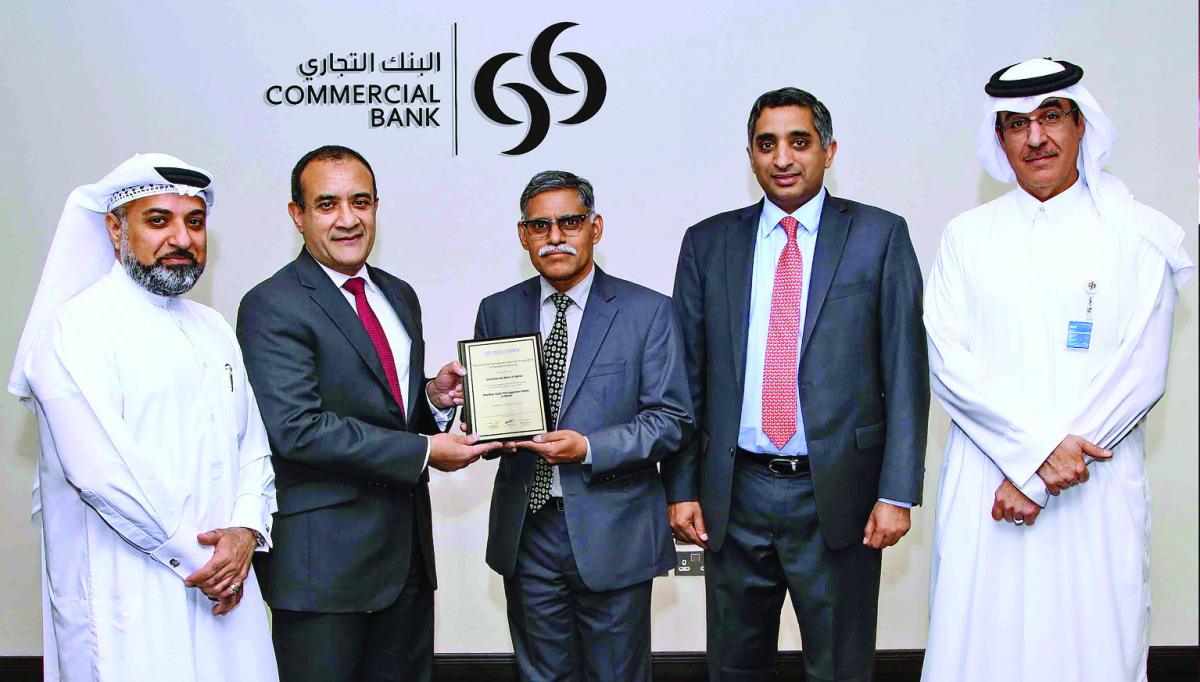 Officials of Commercial Bank receiving the ‘Best Cash Management Bank in Qatar’ award.