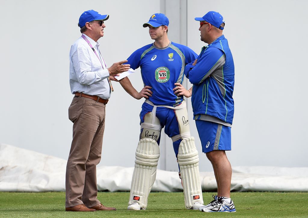 This file photo taken on January 2, 2016, shows Australian cricket selector Trevor Hohns (L) speaks with team captain Steve Smith (C) chief coach Darren Lehmann during a training session in Sydney. AFP / William West 
