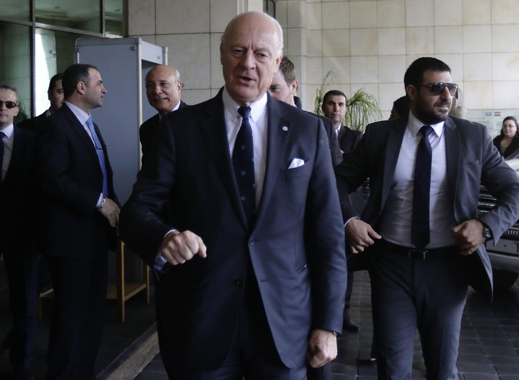 UN Syria envoy Staffan de Mistura arrives (C) arrives for a meeting with Syrian Foreign Minister in the capital Damascus, on November 20, 2016. Syria's government pounded rebel-held Aleppo with fresh fire on November 19, raising the civilian toll over 100