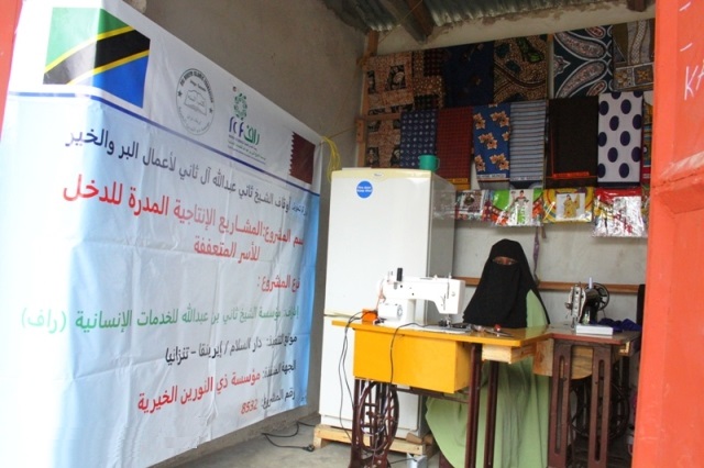 A woman at her tailoring shop provided by RAF in Tanzania.