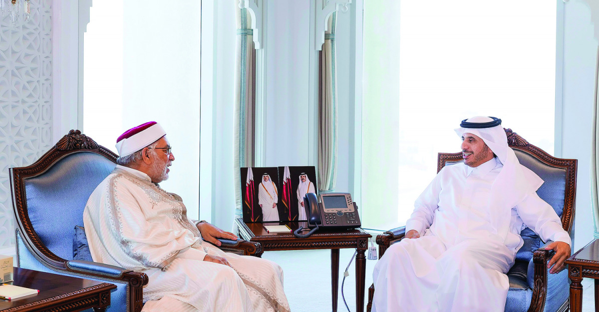 Prime Minister and Interior Minister H E Sheikh Abdullah bin Nasser bin Khalifa Al Thani with First Vice-President of the Republic of Tunisia's Assembly of the Representatives, Abdelfattah Mourou, in Doha yesterday.