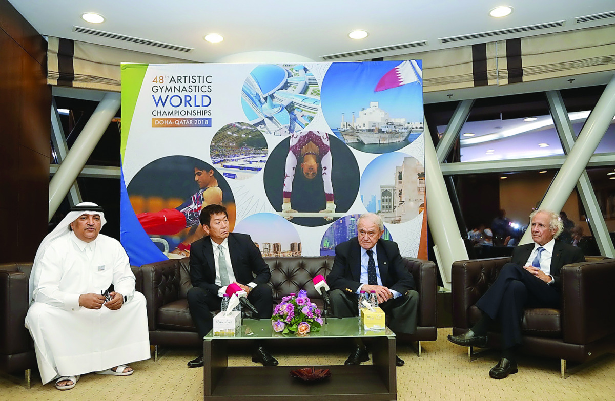 Qatar Gymnastics Federation (QGF) President Ali Al Hitmi, International Gymnastics Federation (FIG) Morinare Watanabe and the outgoing International Gymnastics Federation (FIG) President Bruno Grandi speak to media during the later's visit to QGF Headquar