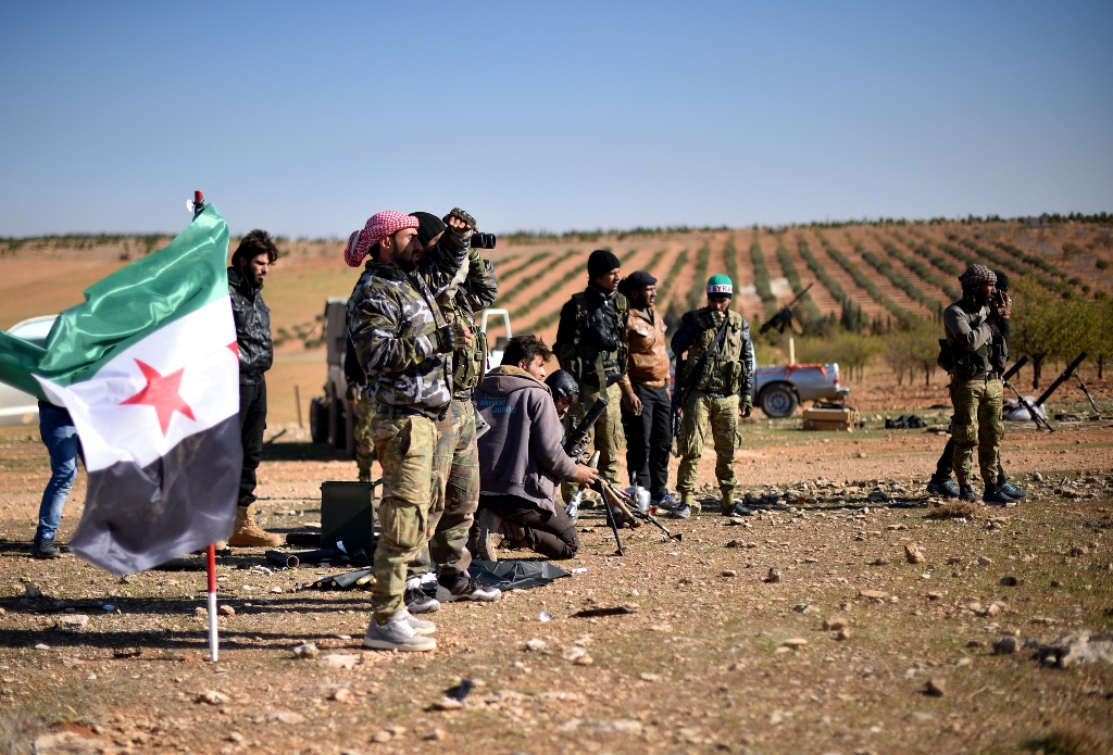 ALEPPO, SYRIA - NOVEMBER 21: Free Syrian Army (FSA) members attack IS terrorists' positions at Kabasin neighborhood in Aleppo, Syria on November 21, 2016. / AA.
