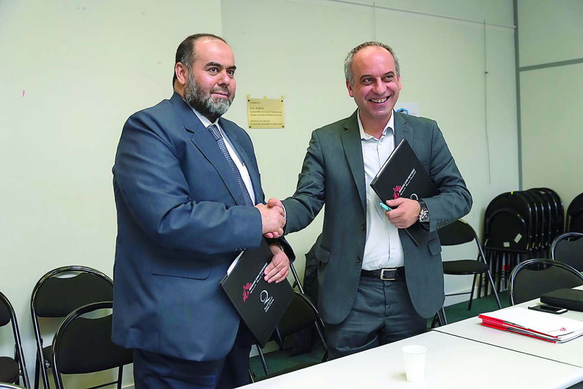 Yousuf bin Ahmed Al Kuwari (left), Executive Director of Qatar Charity, and Dr Méguerditch Tarazian, President of MSF France, after signing the MoU in Paris.