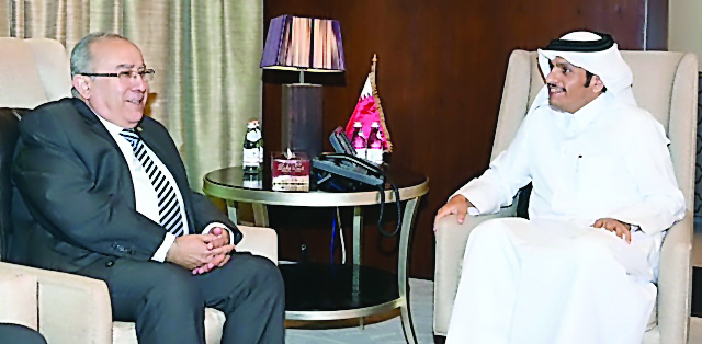 Foreign Minister H E Sheikh Mohammed bin Abdulrahman Al Thani with the Minister for Foreign Affairs and International Cooperation of Algeria Ramtane Lamamra, in Doha, yesterday.