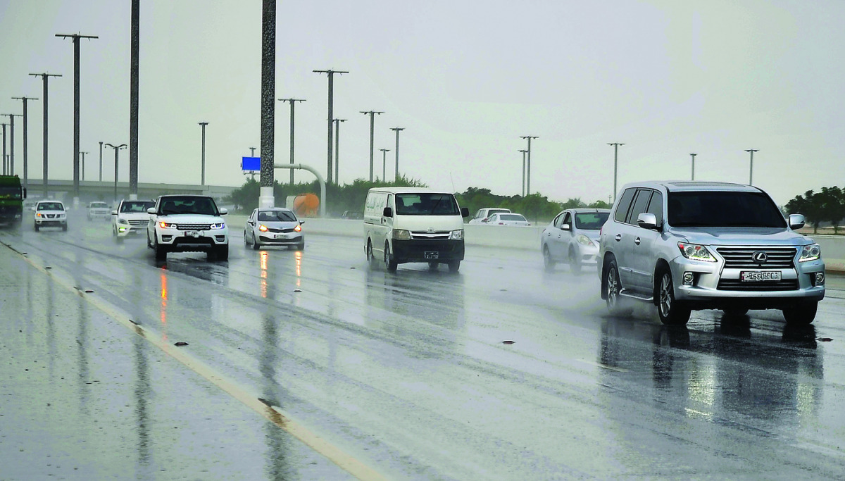 Light rain on Airport Road yesterday.  Pic Abdul Basit/ The Peninsula
