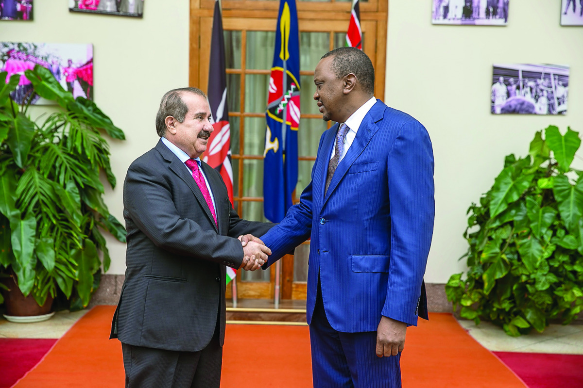 President of the Republic of Kenya, Uhuru Kenyatta (right), with Qatar's Ambassador to Nairobi, Ibrahim bin Mohammed Al Abdullah on the occasion of ending his tenure. 