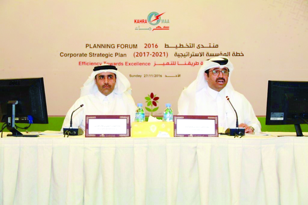 Minister of Energy and Industry H E Dr Mohammed bin Saleh Al Sada and Kahramaa President Eng Essa bin Hilal Al Kuwari at the Annual Planning Forum of Kahramaa, yesterday.
