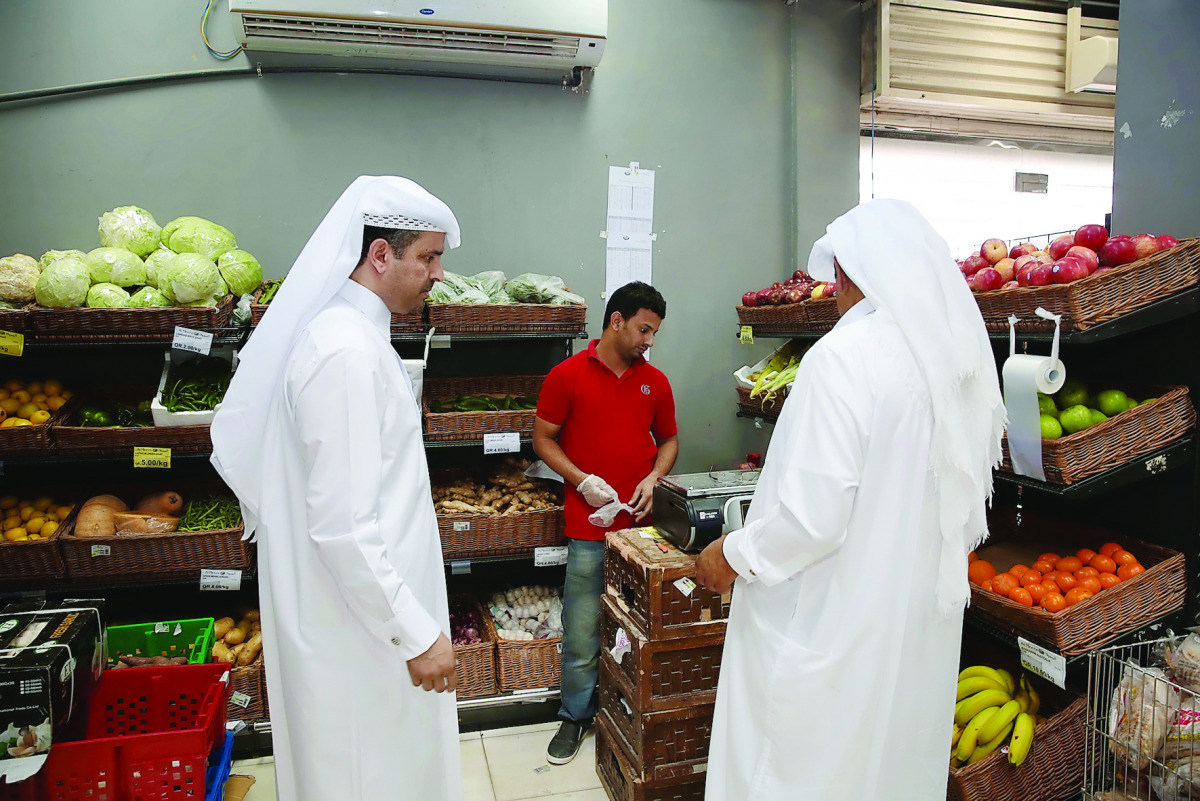 Officials checking at one of the shops.