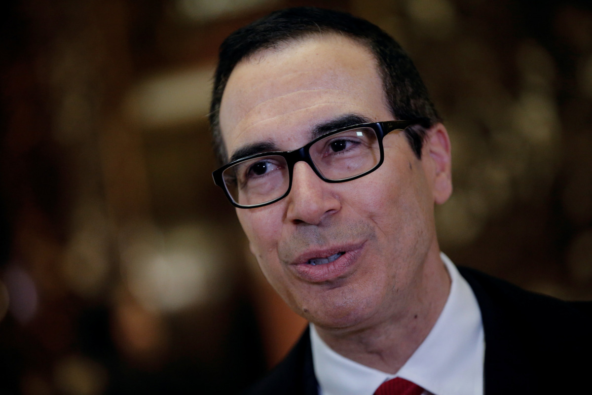 Steven Mnuchin, U.S. President-elect Donald Trump's reported choice for U.S. Treasury Secretary, speaks to members of the news media upon his arrival at Trump Tower in New York, U.S. November 30, 2016. REUTERS/Mike Segar