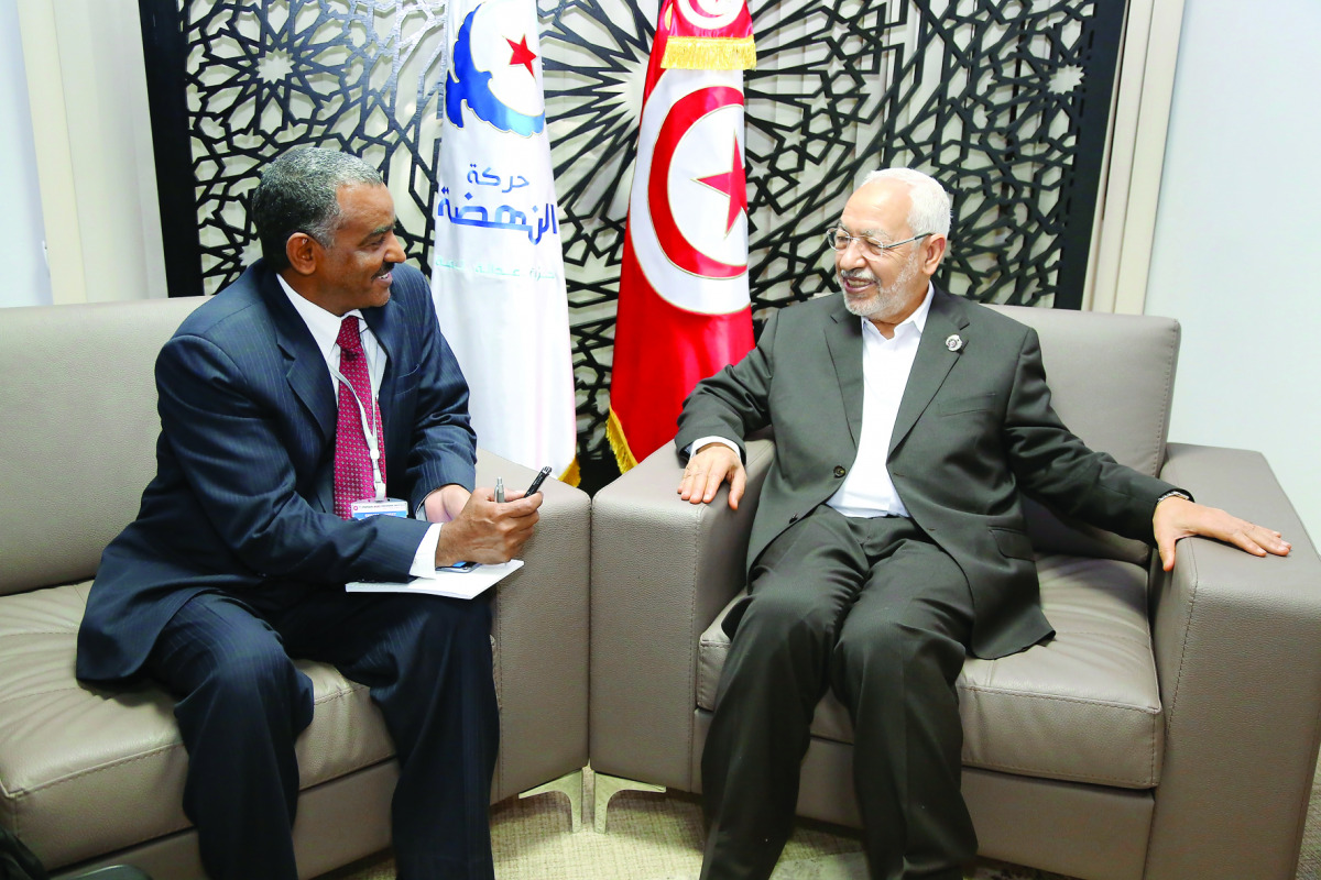 Ennahda Party chief Rached Ghannouchi (Right) with The Peninsula journalist Mohammed Osman
