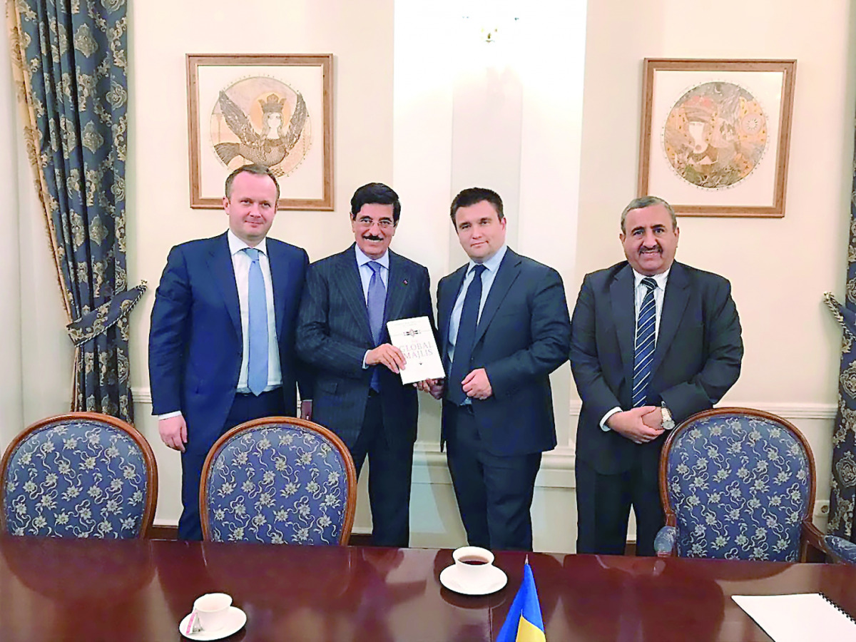 Prime Minister of Ukraine, Volodymyr Groysman, and other officials with H E Dr Hamad bin Abdulaziz Al Kawari, Cultural Adviser at the Emiri Diwan and Qatar's candidate for the post of the Director-General at the Unesco in Kiev on Friday.