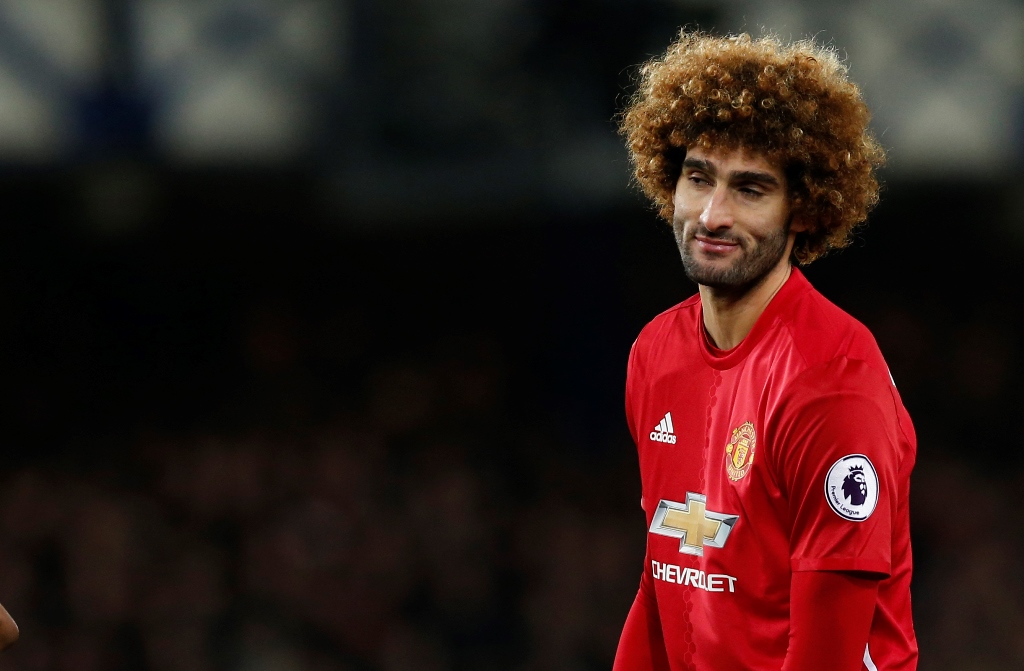  Manchester United's Marouane Fellaini looks dejected after conceding a penalty. Reuters / Andrew Yates