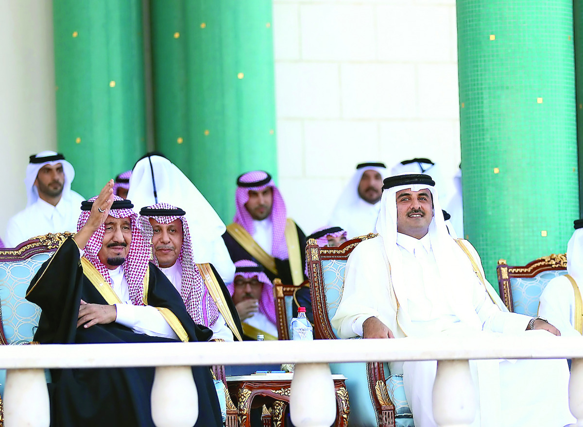 The Custodian of the Two Holy Mosques King Salman bin Abdulaziz Al Saud with the Emir H H Sheikh Tamim bin Hamad Al Thani during the official welcoming ceremony at the Emiri Diwan, yesterday.