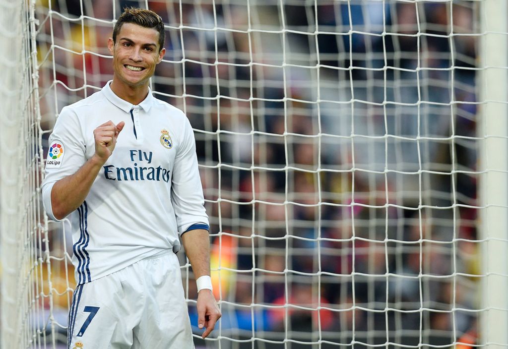 (FILES) This file photo taken on December 3, 2016 shows Real Madrid's Portuguese forward Cristiano Ronaldo gesturing during the Spanish league football match FC Barcelona vs Real Madrid CF at the Camp Nou stadium in Barcelona. AFP / Lluis GENE
