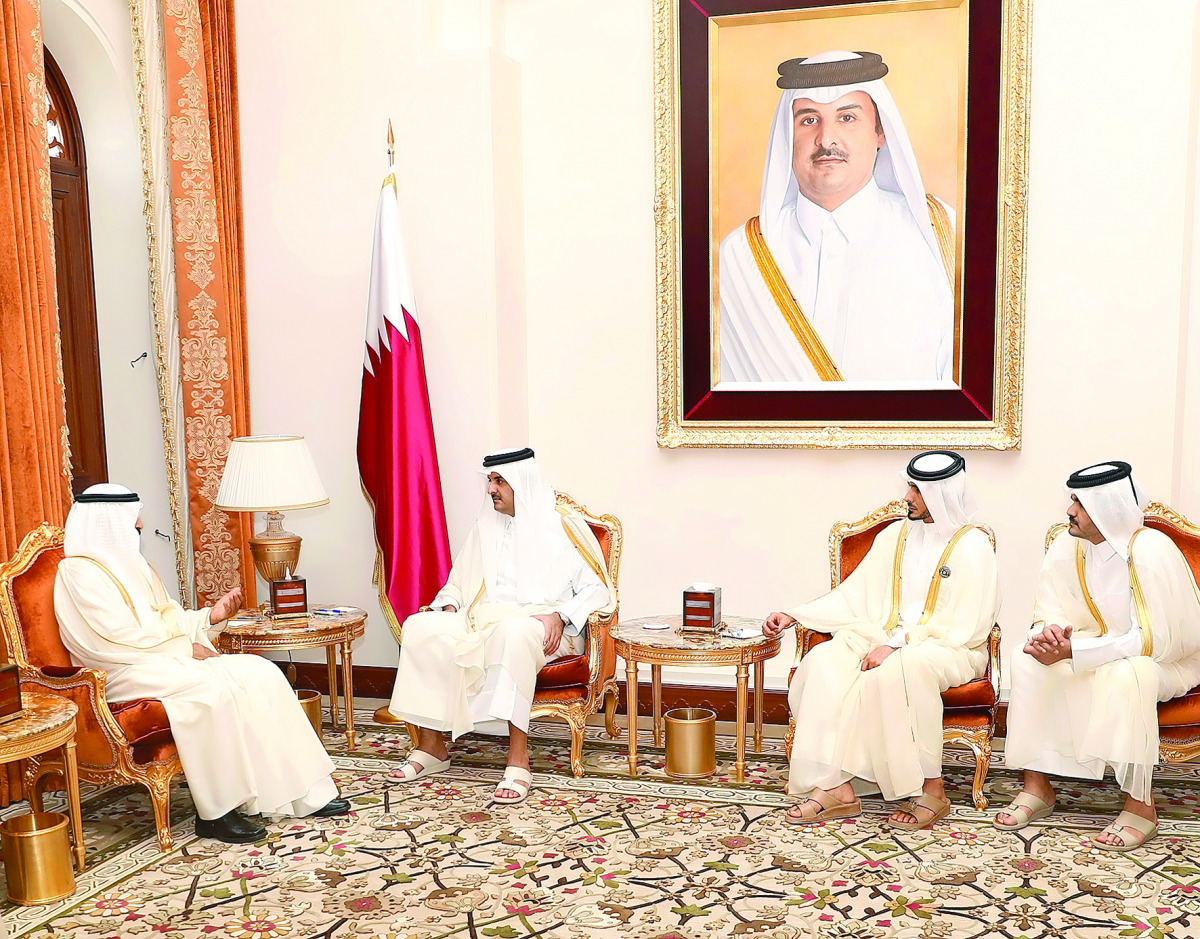 Emir H H Sheikh Tamim bin Hamad Al Thani with the Prime Minister of the Kingdom of Bahrain Prince Khalifa bin Salman Al Khalifa at the Sakhir Palace in Bahrain yesterday.