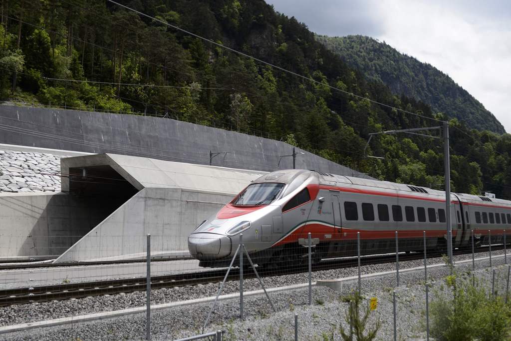 This file photo taken on May 31, 2016 shows an Italian train making its way at the north entrance of the new Gotthard Base Tunnel, the world's longest train tunnel, on the eve of its inauguration in Erstfeld.
Regular rail service through the world's long