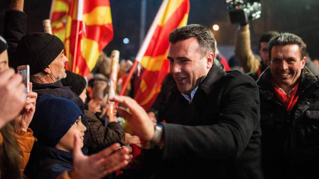 Zoran Zaev (C), the leader of the oppositional Social Democratic Union of Macedonia (SDSM) party, greets his supporters during their last election rally in Skopje on December 9, 2016 ahead of parlamentary elections to be held on 11 December. Robert ATANAS