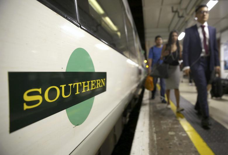 File photo of passengers disembarking a Southern train at Victoria Station in London. Reuters/Neil Hall