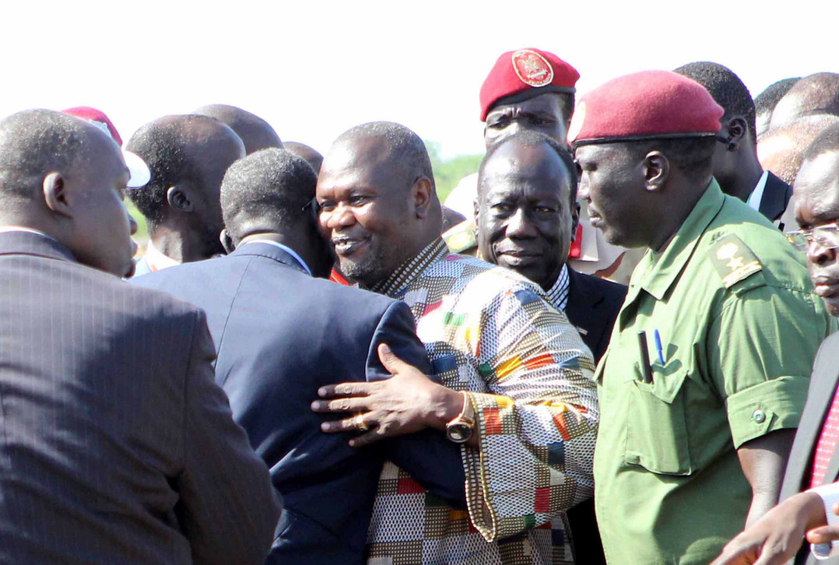 FILE PHOTO: South Sudanese rebel leader Riek Machar, who fled to Democratic Republic of Congo in August after fierce fighting, is being held in South Africa to stop him stirring up trouble, diplomatic and political sources said on Tuesday.