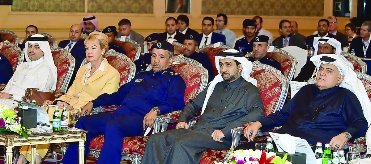 Brigadier Muhammad Saad Al Kharji, Dr Hassan Al Derham and Brigadier Mohamed Al Malki and other officials at the forum on traffic safety held at the Ritz-Carlton Doha.
