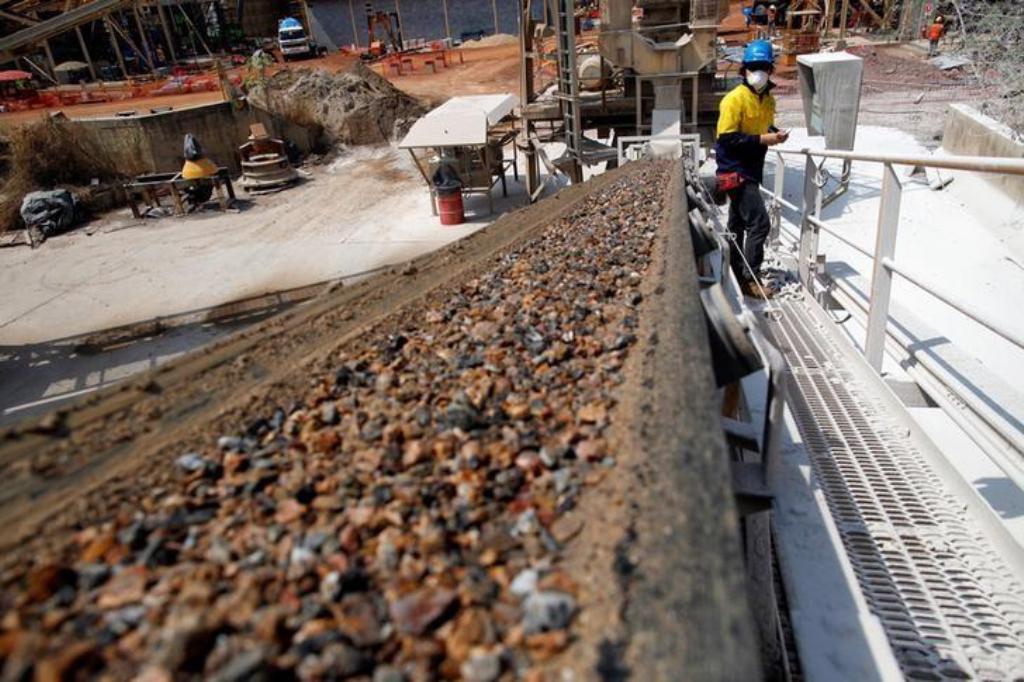 Gold ore is transported on a belt at the Chatree gold mine operated by Akara Mining in Phichin. REUTERS/Damir Sagolj/File Photo
