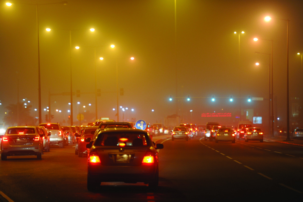 Strong winds reduce visibility on the D-Ring Road in Doha yesterday.  Pic: Salim Matramkot / The Peninsula