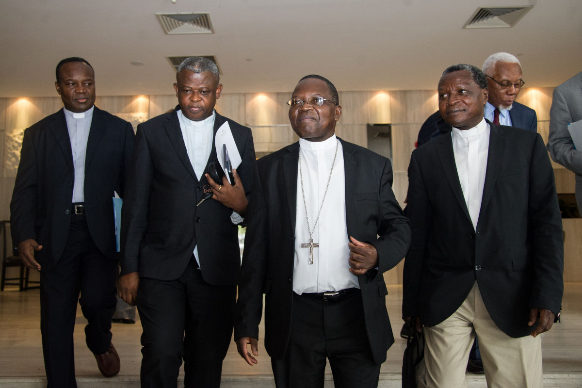 This file photo taken on November 12, 2016 shows delegates and members of Congolese Episcopal conference (Conference episcopale nationale du Congo, Cenco) arriving to meet United Nations Security Council's members in Kinshasa at the start of a three-day v