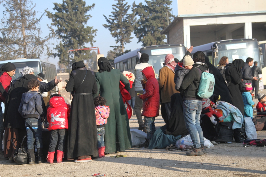 Civilians evacuated from the east part of Aleppo that had been under siege by Assad Regime forces and its supporter foreign terrorist groups, arrive Syria's Rashidin area on December 19, 2016. ( Firas Faham - Anadolu Agency )
