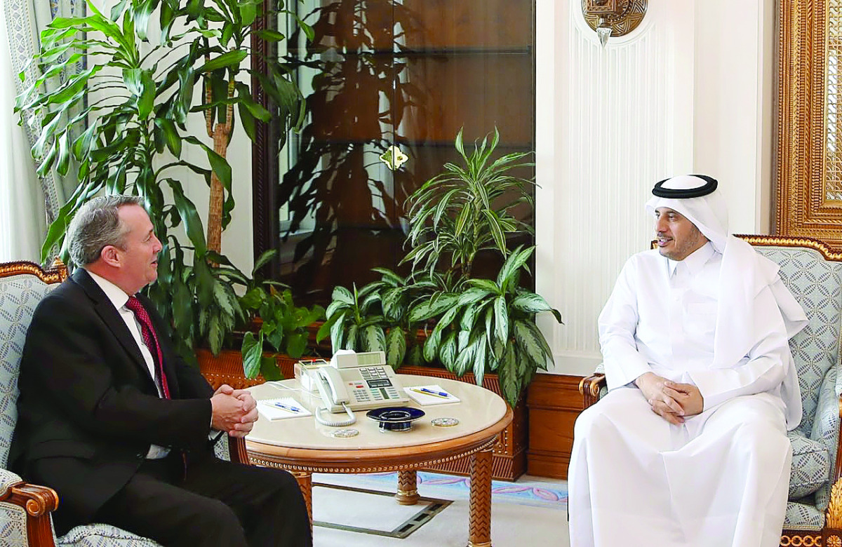 Prime Minister and Interior Minister H E Sheikh Abdullah bin Nasser bin Khalifa Al Thani with UK's Secretary of State for International Trade and President of the Board of Trade, Liam Fox, in Doha yesterday. They reviewed bilateral relations and ways of e