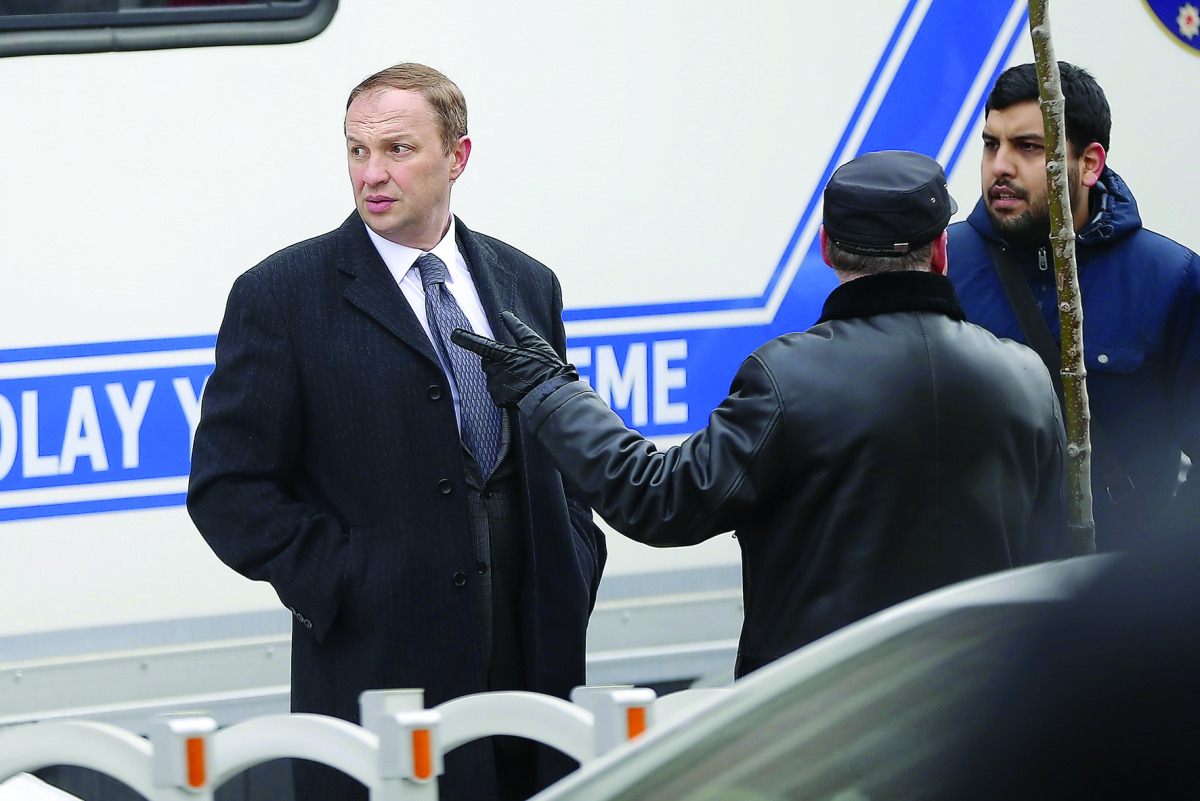 Russian investigators inspect the scene of Karlov murder at the Contemporary Arts Center in Cankaya in Ankara, yesterday.