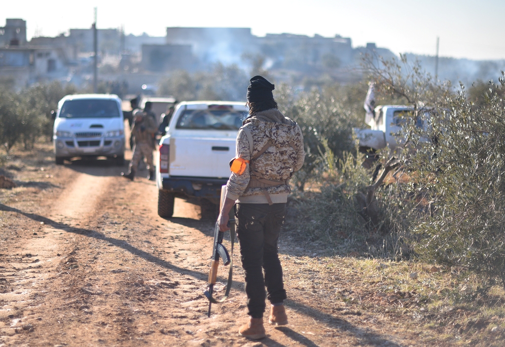 Members of Free Syrian Army move to al-Bab town of Aleppo during the 