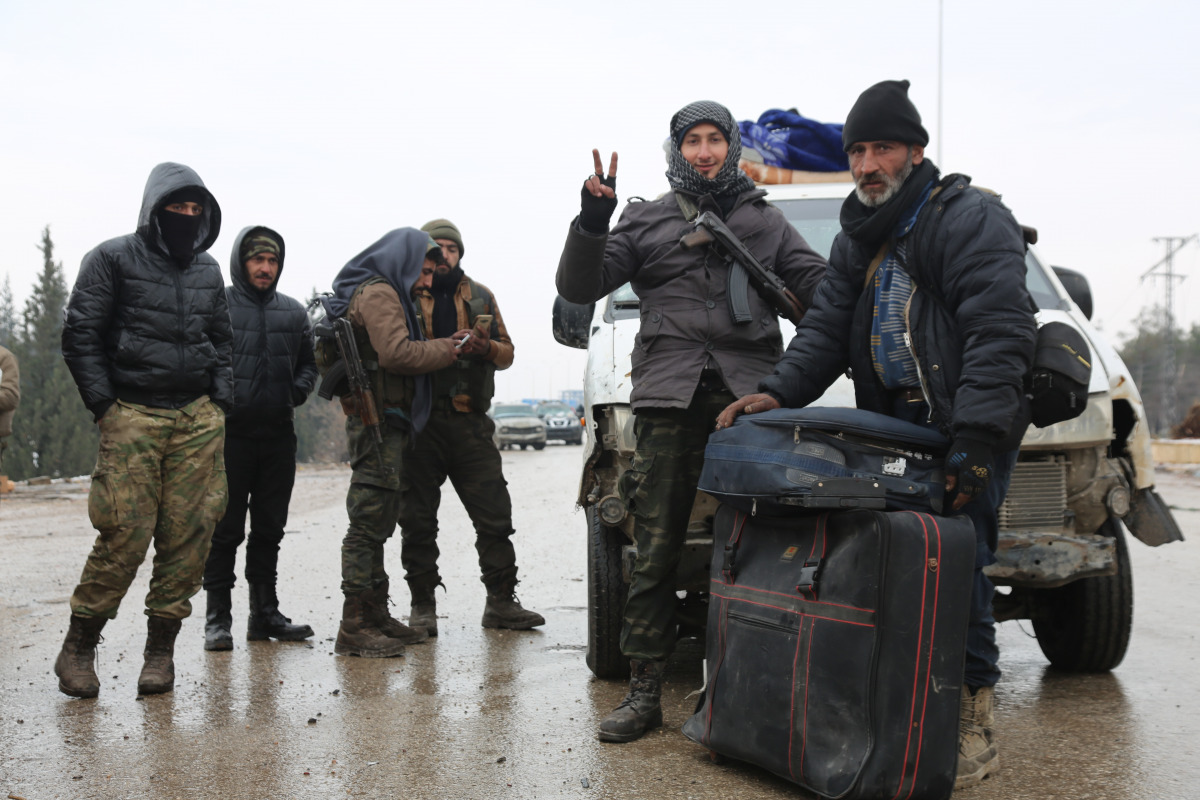 A convoy, evacuating civilians and opposition group members who left east Aleppo that had been under siege by Assad regime and its supporter foreign terrorists, arrive in opposition controlled Rashideen Town of Aleppo, Syria on December 22, 2016 . ( Ahmed