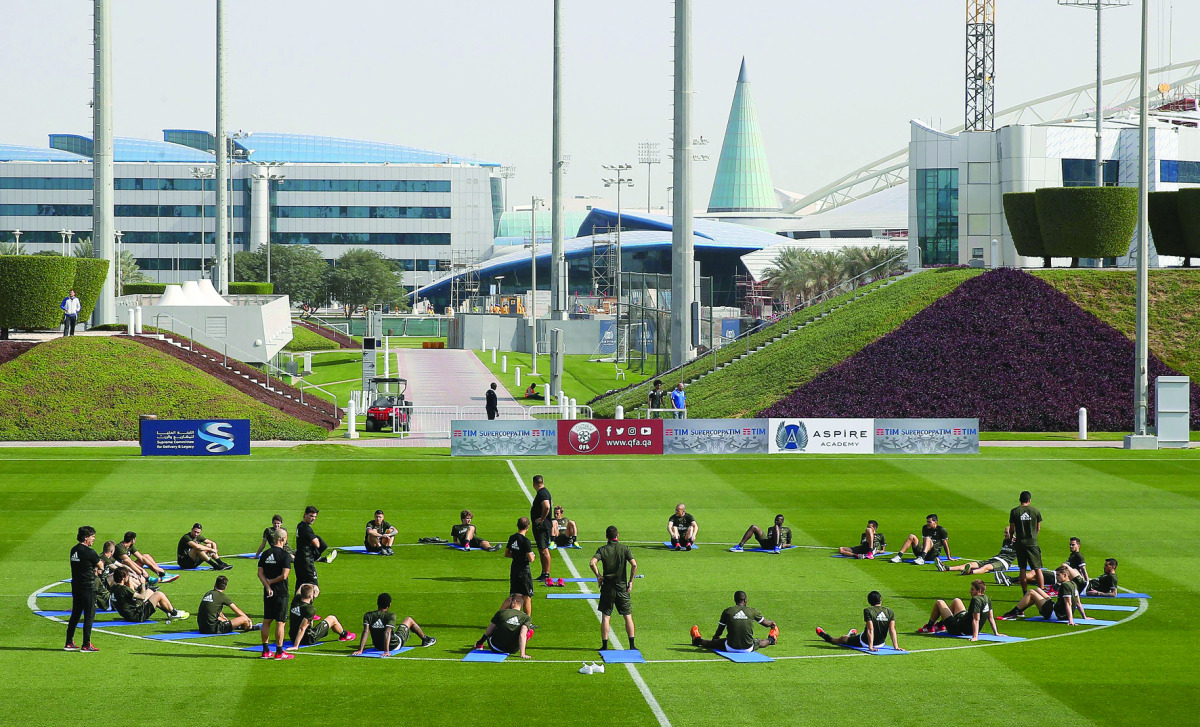 AC Milan players take part in a training session ahead of the Final of the Italian Super Cup which will be played in Doha yesterday.