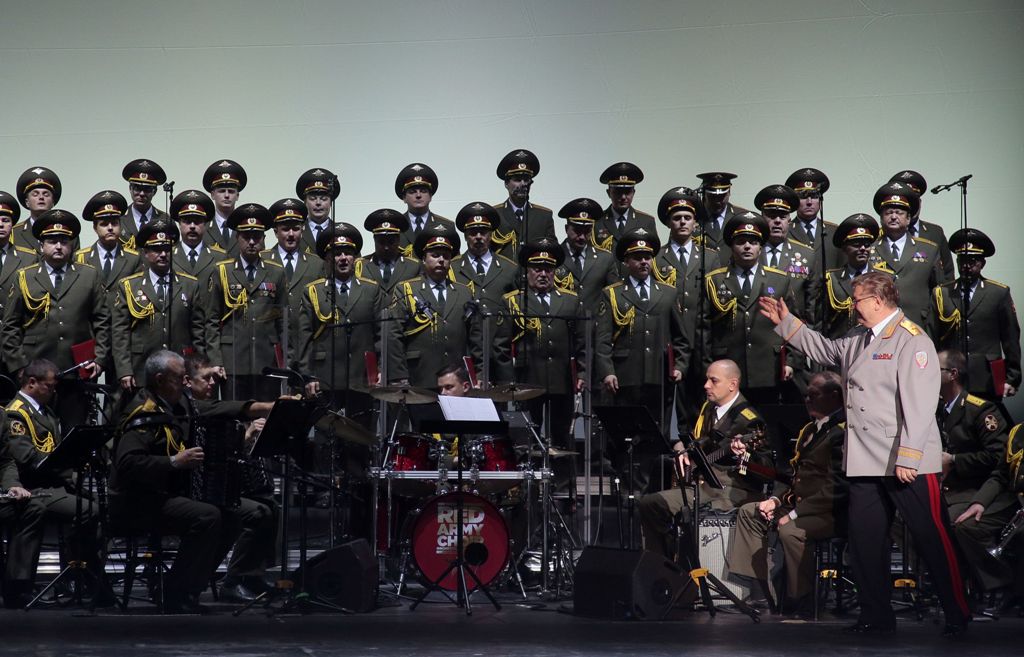 (FILES) This file photo taken on October 23, 2015 shows the official army choir of the Russian armed forces, also known as the Alexandrov Ensemble, standing while the choir conductor General Viktor Eliseev (R) arrives onstage at the Palais des Sports in P