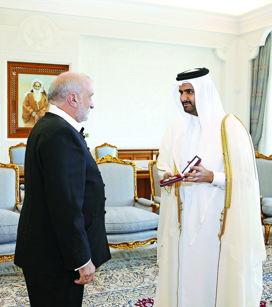 Deputy Emir H H Sheikh Abdullah bin Hamad Al Thani with Hungarian Ambassador Elter Istvanon, who is ending his tenure in Qatar, at the Emiri Diwan yesterday. The Deputy Emir granted the ambassador the Decoration of Al Wajbah in recognition of his efforts 