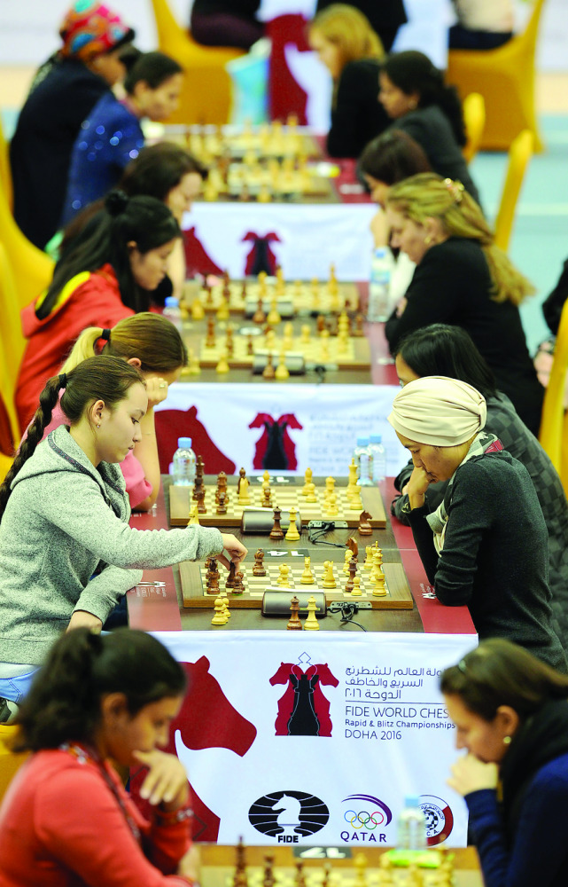 Players compete during the 2016 FIDE World Rapid and Blitz Championships at the Ali Bin Hamad Al Attiya Arena in Doha yesterday. Picture by: Salim Matramkot/The Peninsula

