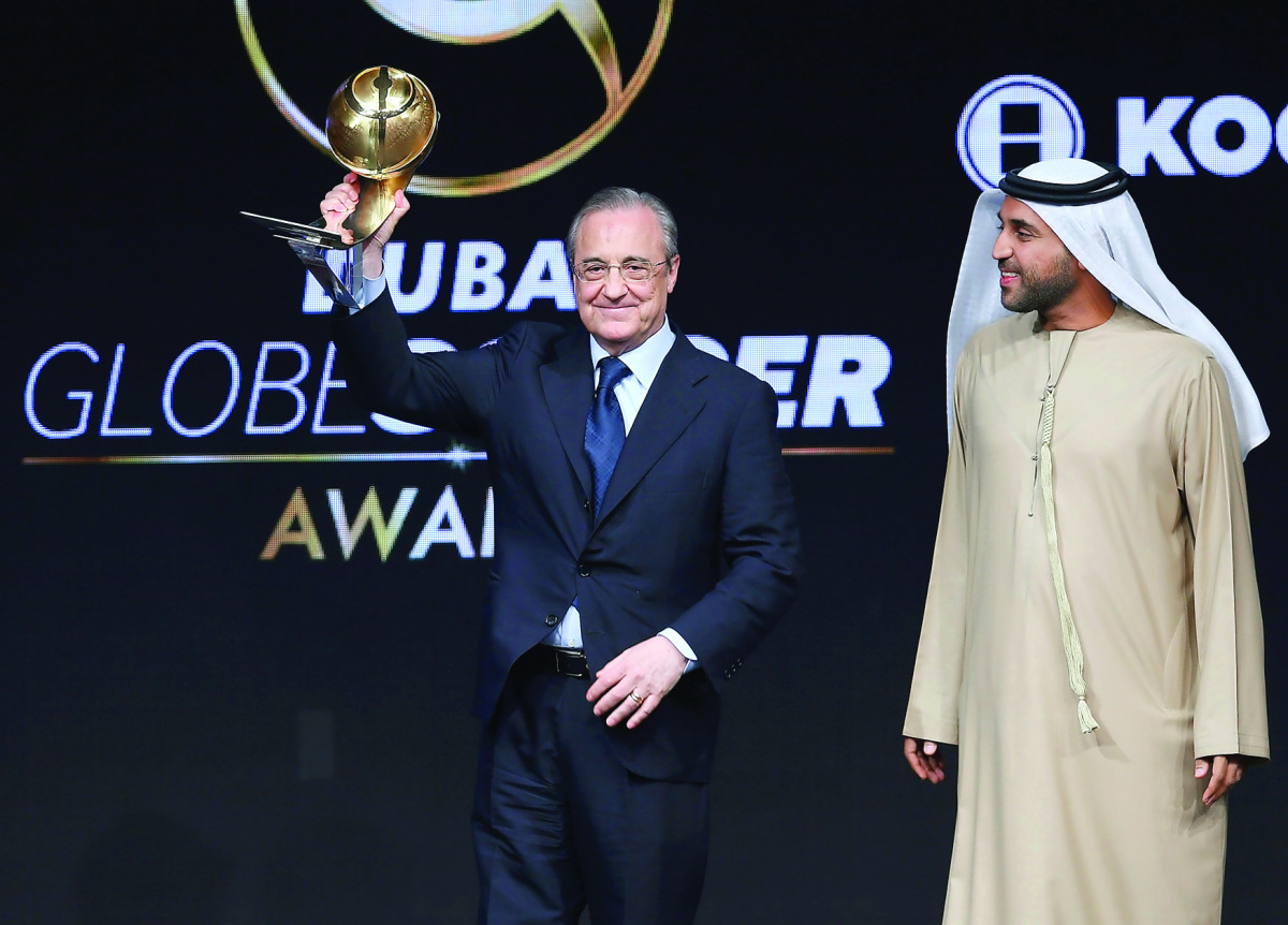 Florentino Perez, President of Real Madrid, receives Best Club of the Year award during the Dubai Globe Soccer Awards Ceremony in Dubai, United Arab Emirates, on Tuesday.