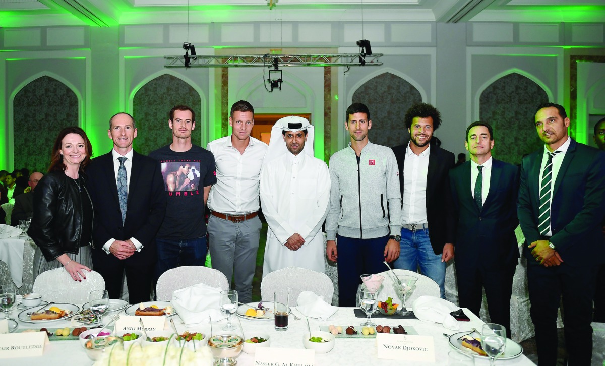  QTF President Nasser Al Khelaifi and the President and General Manager of ExxonMobil Qatar Alistair Routledge pose for a photograph with World No.1 Andy Murray, the defending champion Novak Djokovic, Tomas Berdych and Jo-Wilfried Tsonga alongside other s