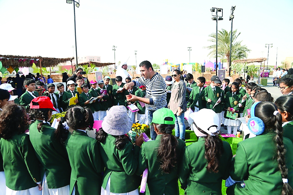 Students visiting Mahaseel Festival attend a session on growing flowering plants, yesterday.