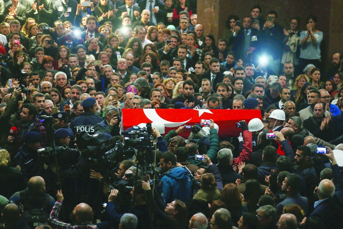 Funeral ceremony of Turkish police officer Fethi Sekin and courthouse officer Musa Can, who were killed in a car bombing on Thursday, in Izmir, yesterday.