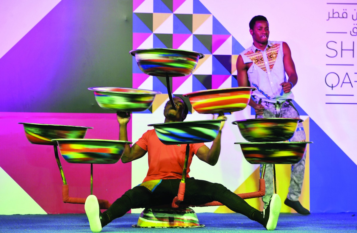 Artists performing at the African Circus organised by Qatar Tourism Authority at the outdoor area of Hyatt Plaza Mall yesterday.  Pic: Kammutty VP/ The Peninsula