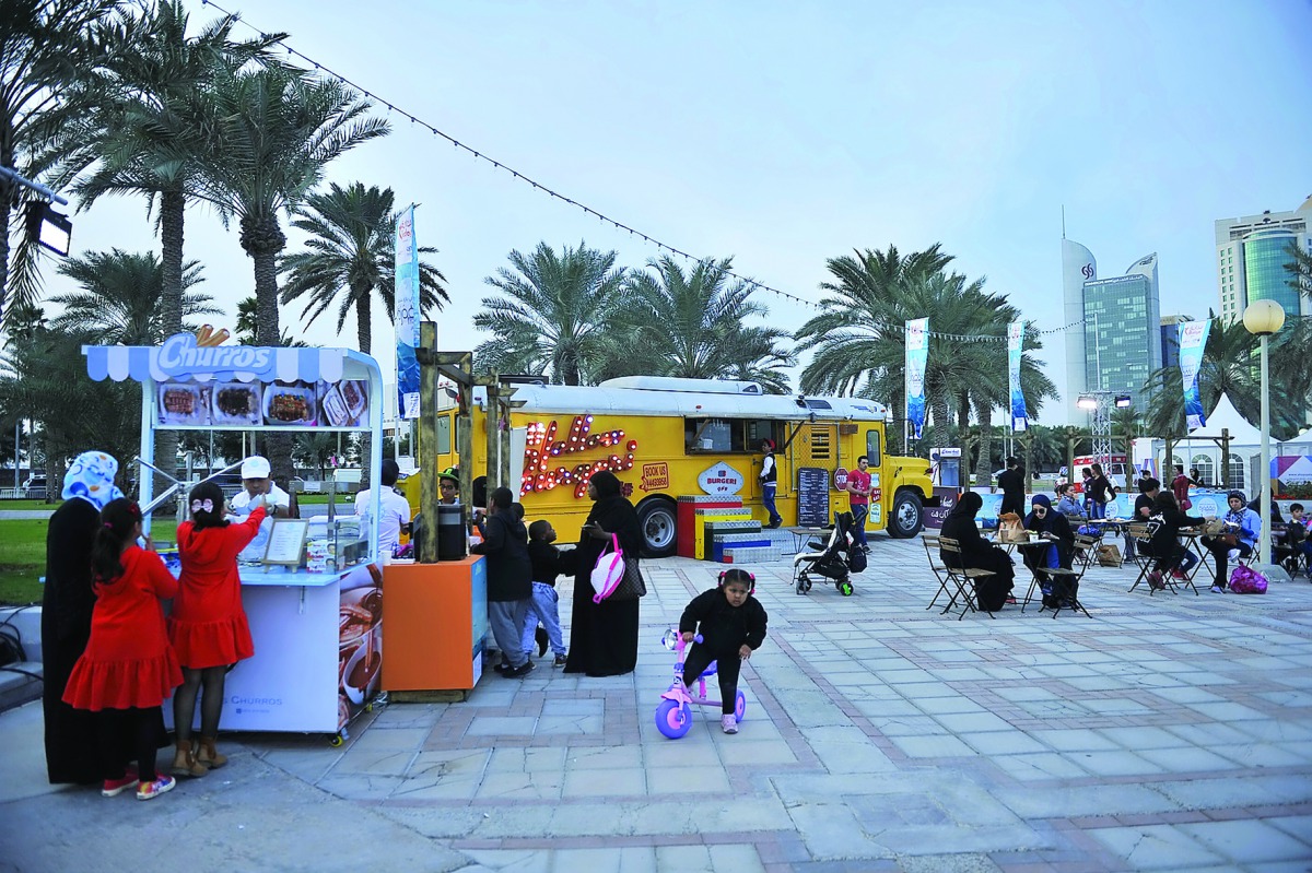 Food trucks and kiosks set up near the Orry statue offering a variety of food items on Doha Corniche during the Shop Qatar Festival yesterday. Pic; Baher Amin/The Peninsula
