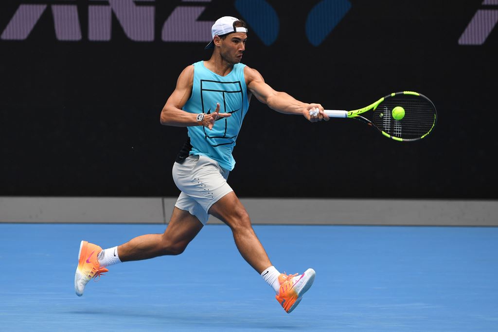 Rafael Nadal of Spain hits a return during a practice session ahead of the Australian Open tennis tournament in Melbourne on January 15, 2017. AFP / WILLIAM WEST